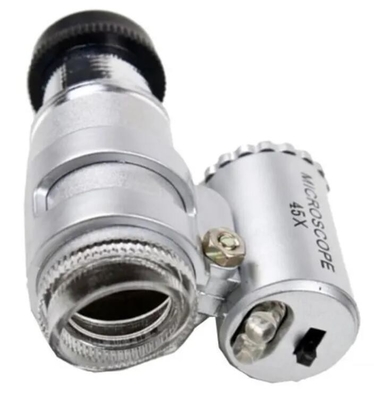 MG10081-4 Mini LED portátil 45x 60x Magnificação Pocket Jeweler Loupes Glass Silver Lens Instrumento óptico de ampliação fornecedor